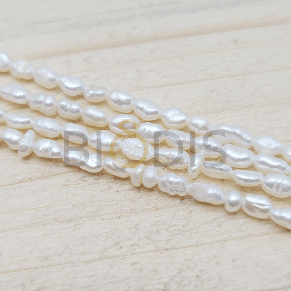 PER0473 Perlas de rio con forma recto para manualidad 3x4mm